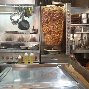 Fresh Israeli salad ingredients prepared at Ha'Kosem