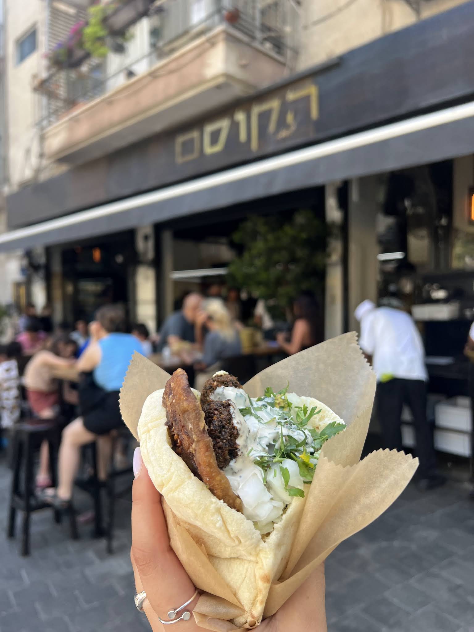 Shawarma turning on the spit at Ha'Kosem restaurant in Tel Aviv